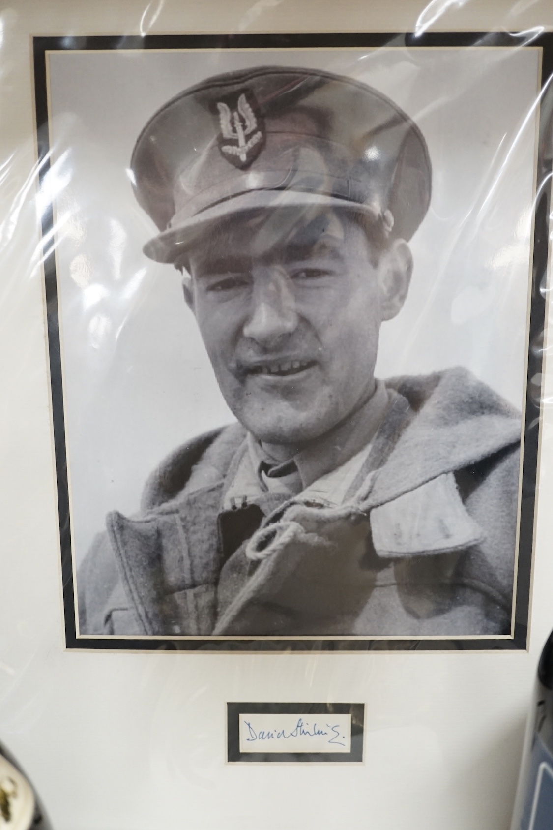 A mounted autograph: David Stirling (founder of the SAS) and two related bottles of wine